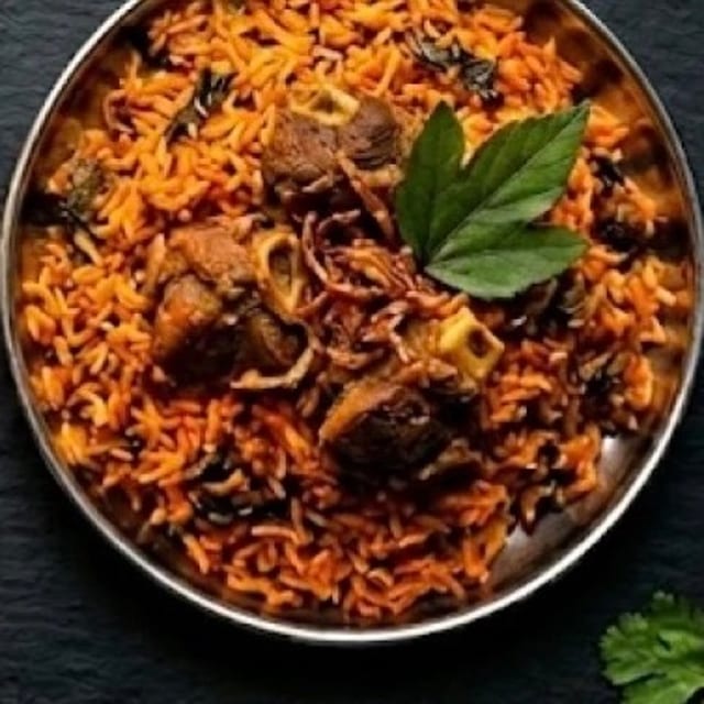 Gongura Goat Biryani Family Pack (64 oz).